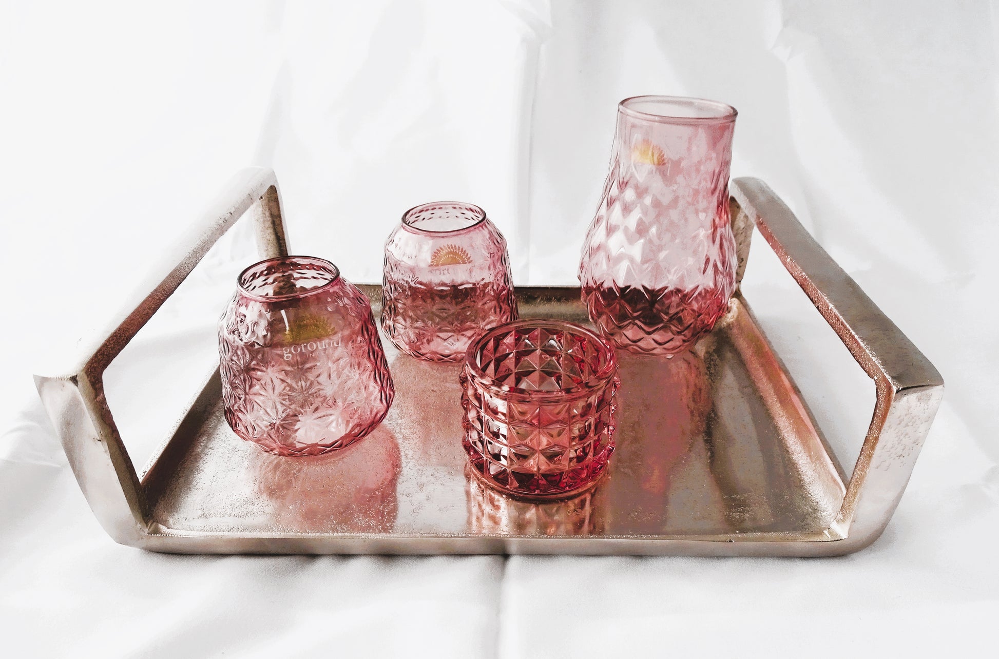 Waxinehouder en vaasjes roze glas set