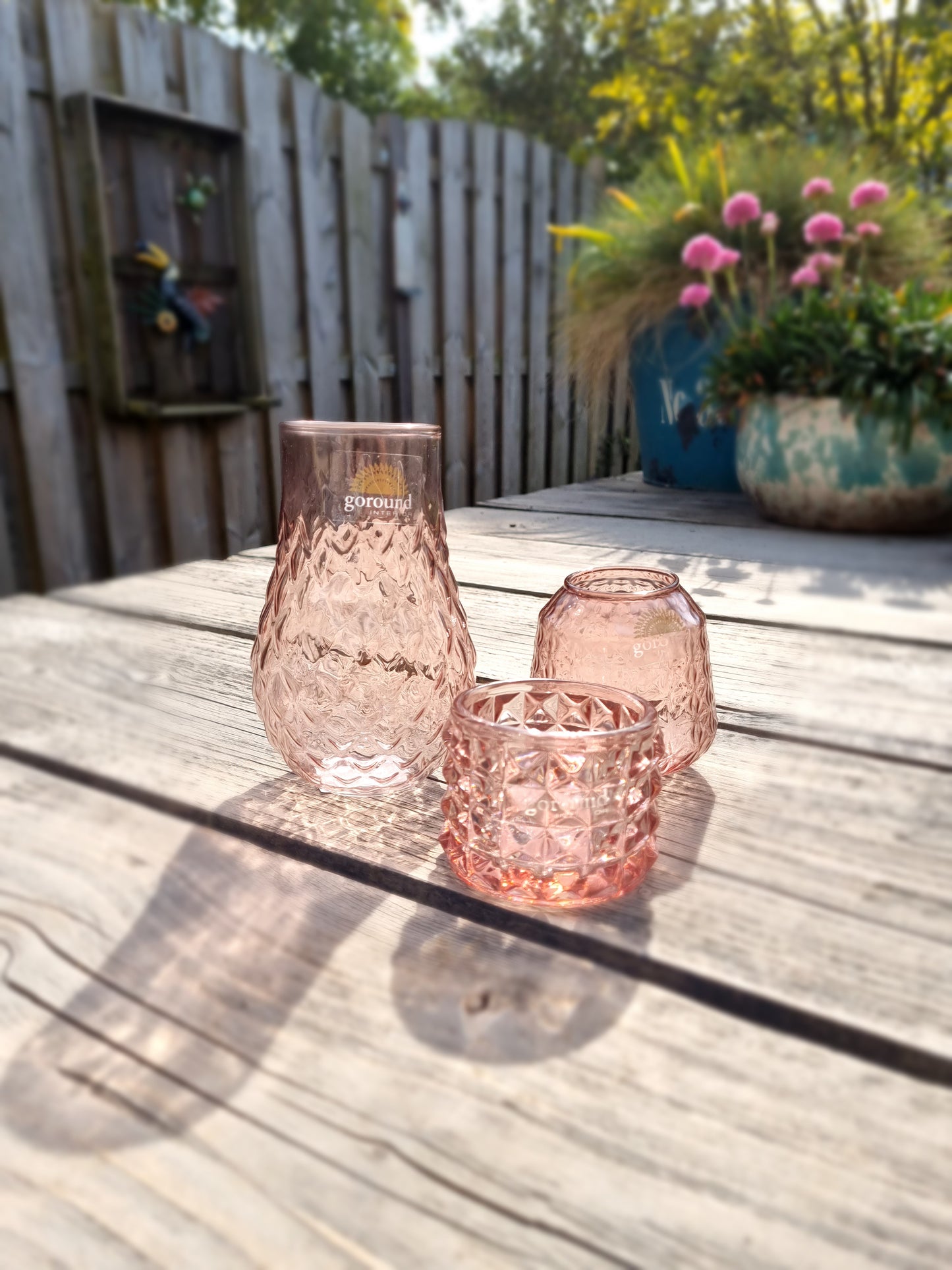 Waxinehouder en vaasjes roze glas set